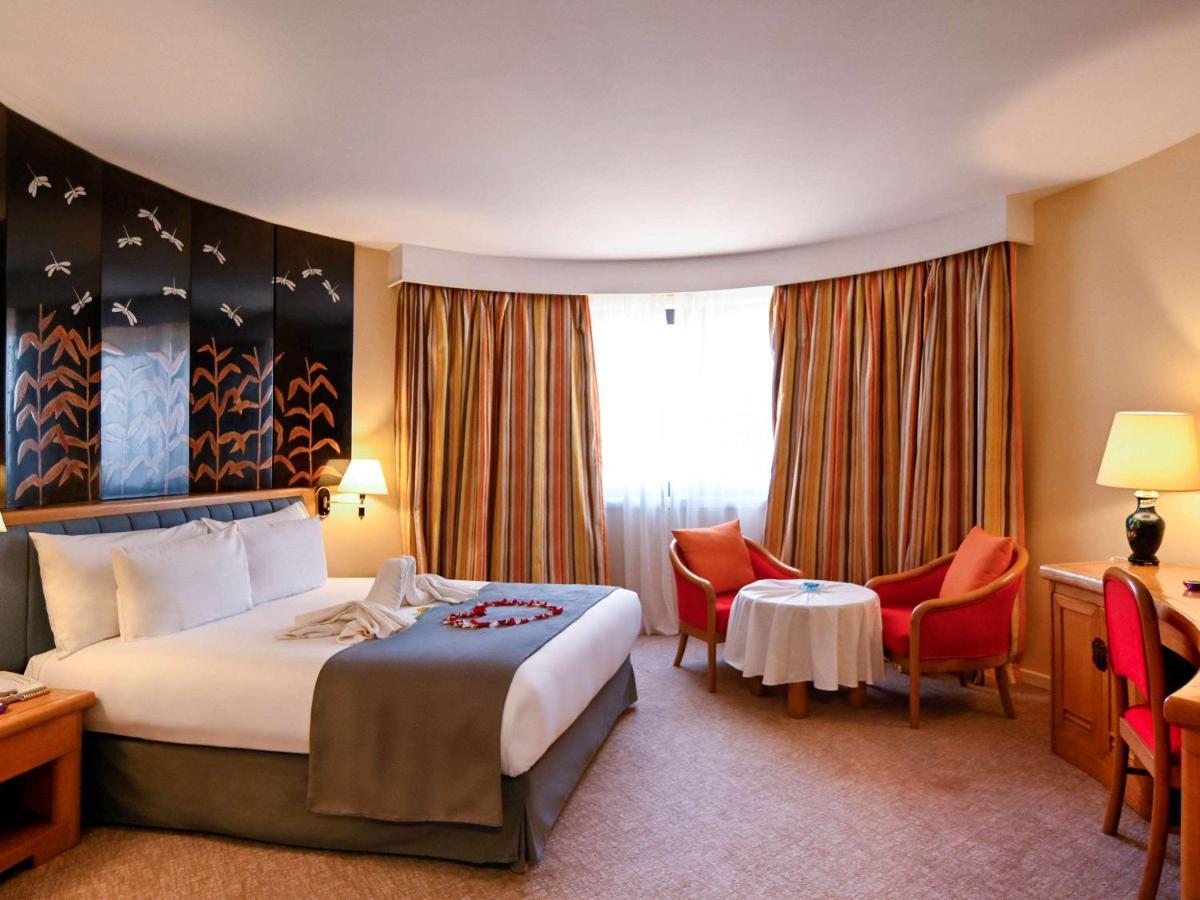 Hotel Mercure Alger Aéroport Dar el Beïda Esterno foto A room at the hotel