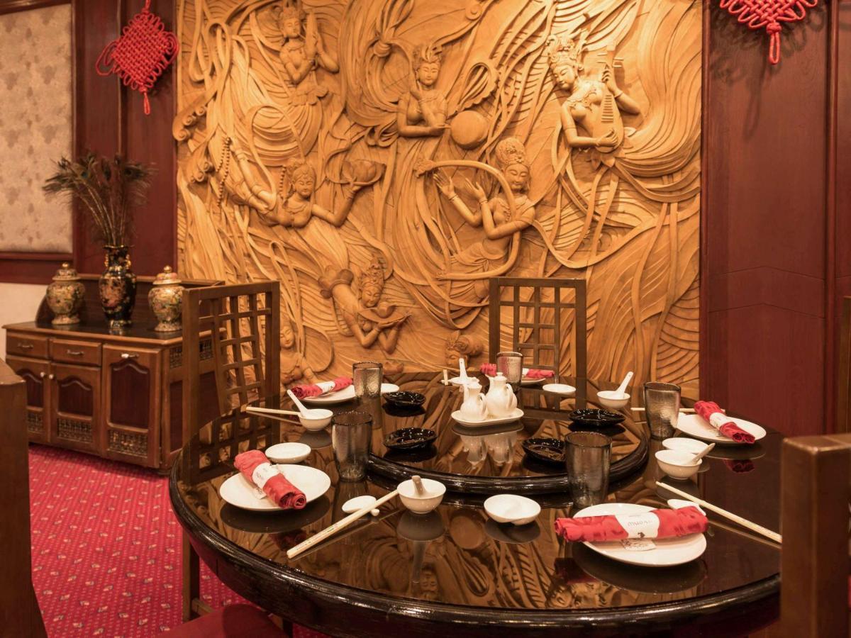 Hotel Mercure Alger Aéroport Dar el Beïda Esterno foto A table set for dim sum