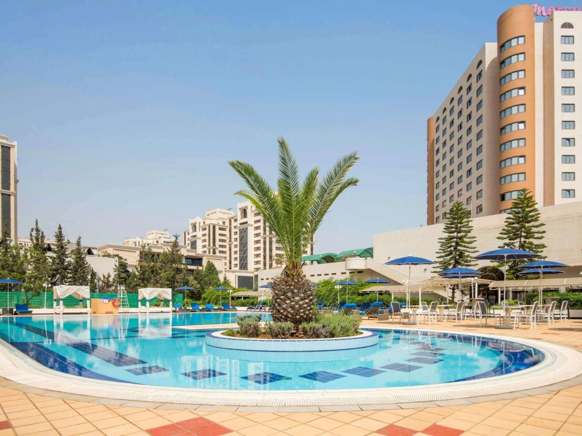 Hotel Mercure Alger Aéroport Dar el Beïda Esterno foto The pool at the hotel